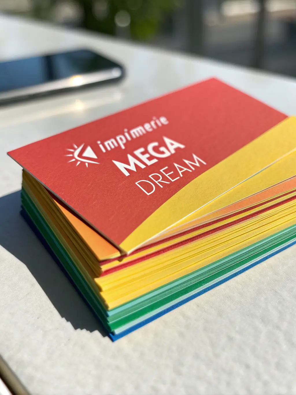 A close-up shot of a stack of freshly printed business cards with the PrintPro logo subtly visible in the background, showcasing the crisp quality and professional finish.